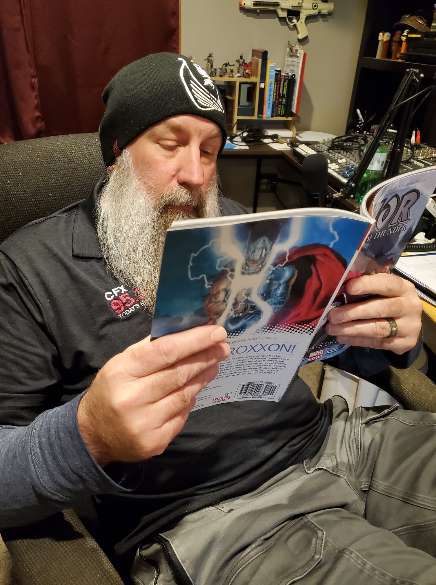 Rob Ryan reading a Thor comic book